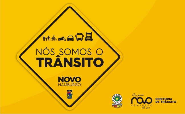 Fundo amarelo com um triângulo escrito no centro "Nós Somos o Trânsito"