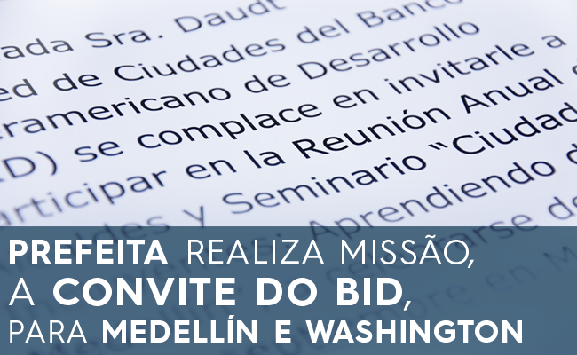 Imagem de um texto escrito em word e o texto abaixo em uma caixa cinza "Prefeita realiza missão a convite do BID para MEdellín e Washington"