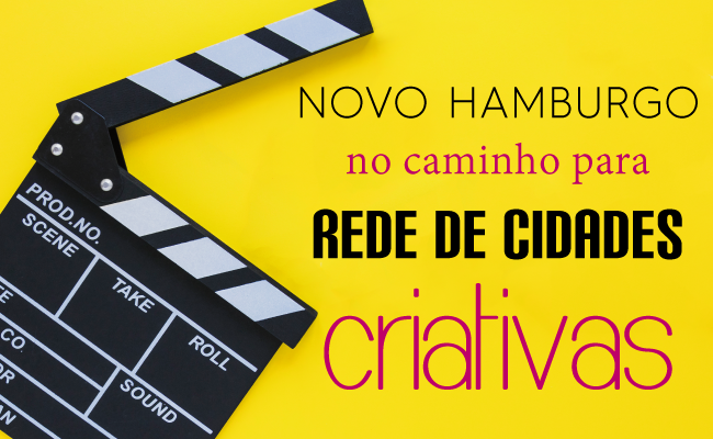 Com uma claquete à esquerda, em um fundo amarelo, escrito Novo Hamburgo no caminho para Rede de Cidades Criativas 